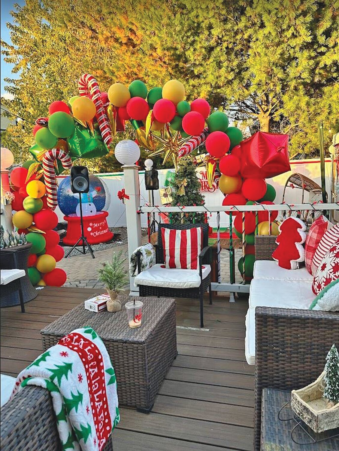 RED, GREEN AND WOW! Josh Clapprood’s Christmas themed party decorations included a cardboard Polar Express, balloon arch, inflatable snow globes, a life-sized Grinch and every winter-themed pillow money could buy. (Submitted photo)